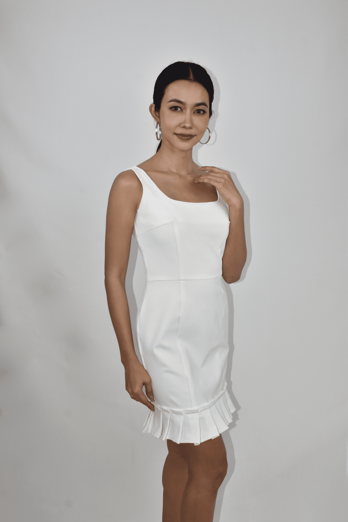 White Mini Dress with Pleated Hem